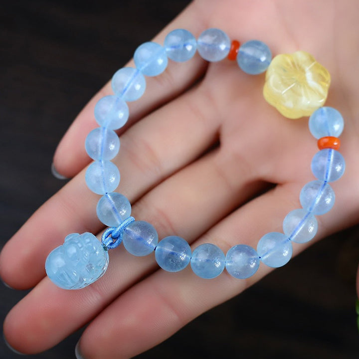 Bransoletka z naturalnego bursztynu i akwamarynu PiXiu Peace Healing Charm