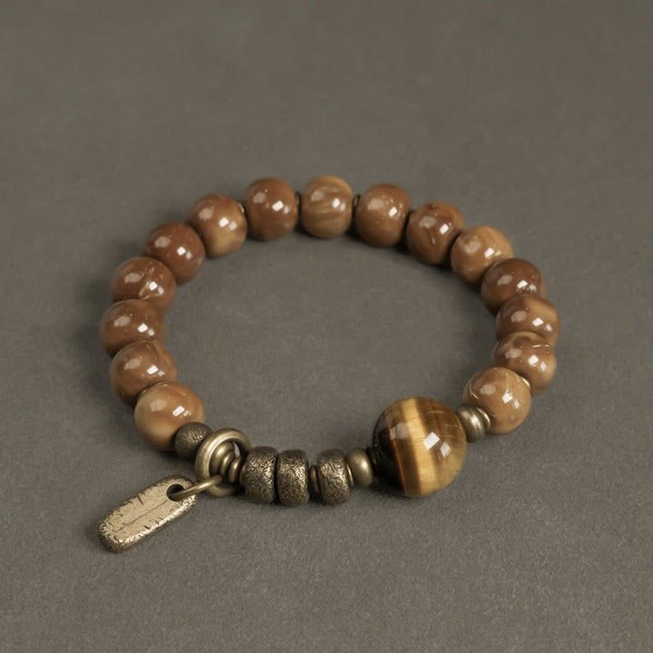 Bransoletka z Buddha Stones , nasiona Kuka, tygrysie oko, złoty połysk obsydianu, mosiądzu i miedzi, zapewniająca bogactwo i szczęście - Kuka Seed&Tiger Eye - 17-17,5 cm - image 0