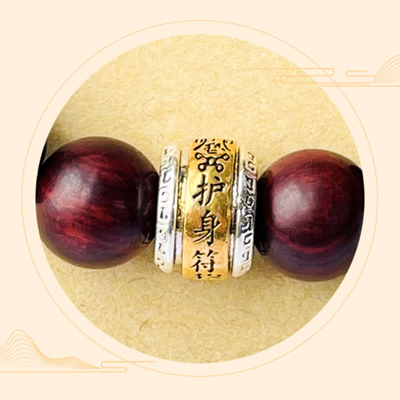 Bransoletka ochronna z amuletem z czerwonego drzewa sandałowego i Buddha Stones