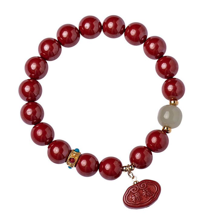Bransoletka z zawieszkami ochronnymi z jadeitu i Buddha Stones
