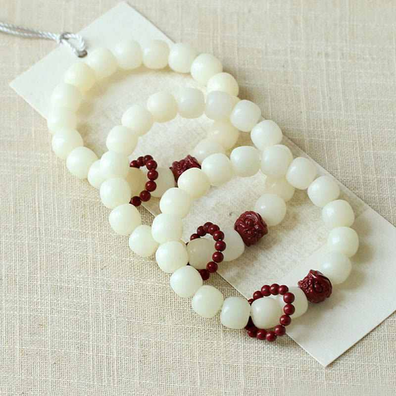 Buddha Stones Naturalne Nasiona Bodhi Cynober Tańczący Lew Charm Mądrość Harmonia Nadgarstek Mala