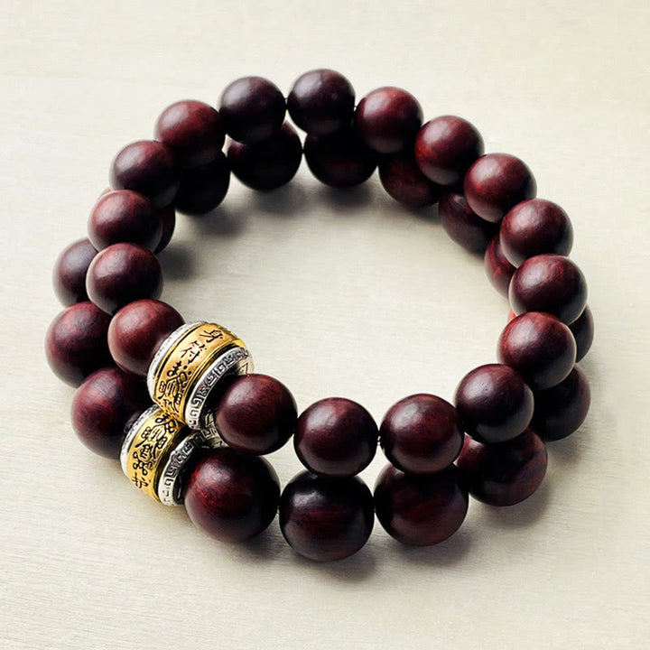 Bransoletka ochronna z amuletem z czerwonego drzewa sandałowego i Buddha Stones